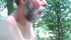 Teen jerks an dude's cock in the woods Thumb