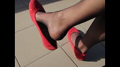 red ballet flats and nylons, balcony shoeplay by Isabelle-Sandrine Thumb